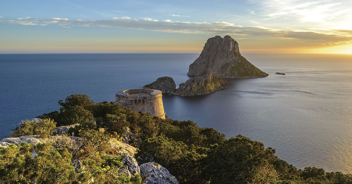 es vedra ibiza con puesta de sol