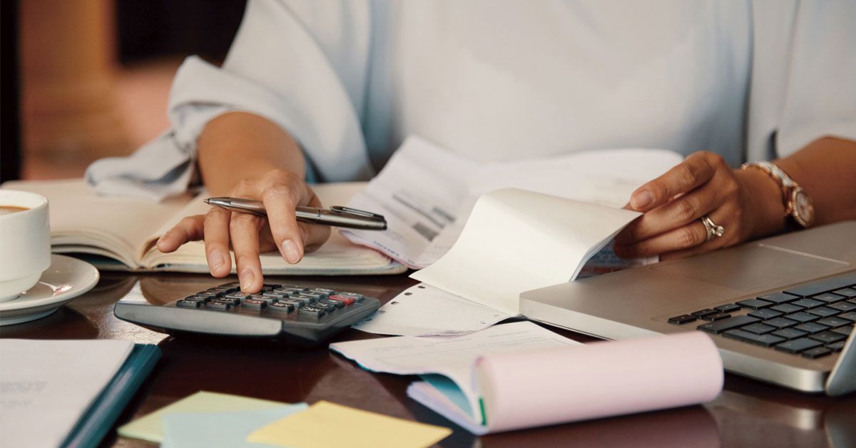 Woman calculating taxes